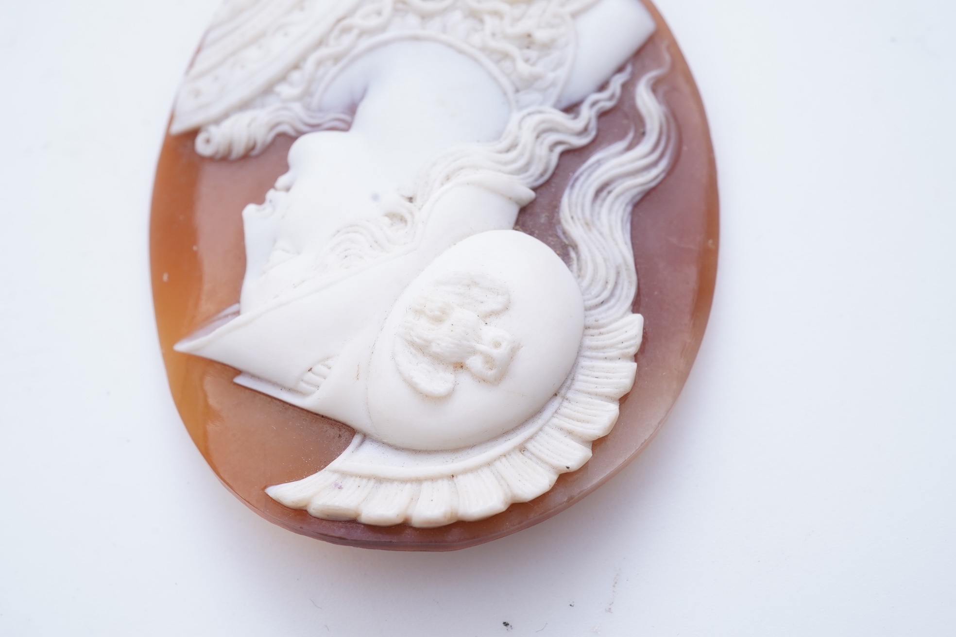 Two cameos and a stick pin, 19th century